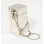 A silver box on chatelaine chain hallmarked Birmingham 1917, maker Mappin and Webb Ltd. Approx. 2
