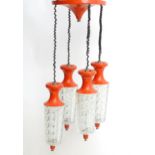 A vintage retro / midcentury ceiling light, the four pendant lamps with hobnail cut glass shades and