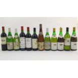Twelve bottles of white and red wine, to include a Baron Philippe Mouton-Cadet Bordeaux 75cl and a