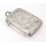 A silver vesta case with engraved decoration. hallmarked Birmingham 1895. 2 1/4" long Please