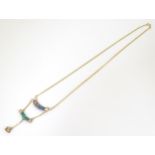 A 9ct gold necklace set with opal. Approx 19" long Please Note - we do not make reference to the