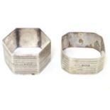 Two Art Deco napkin rings with engine turned decoration, one hallmarked Birmingham 1925, maker F. B.