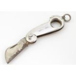 A silver cheroot / cigar cutter, the handle hallmarked London 1889. Approx. 1 1/2" long (closed)