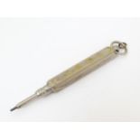 A silver plate propelling pencil with engraved detail. Approx. 2 1/2" long Please Note - we do not