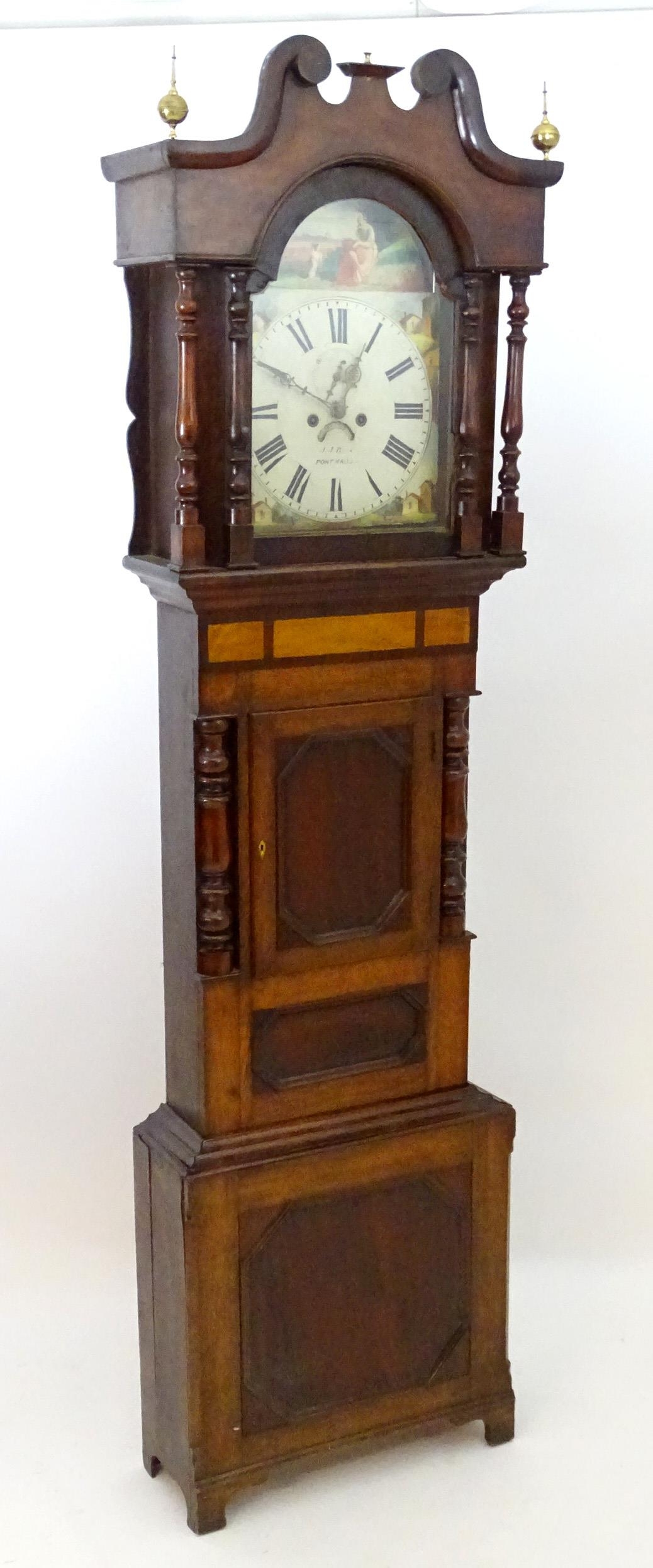 J J Rees Port Madoc : A Welsh Victorian longcase clock with 14" painted dial and 8-day movement. The