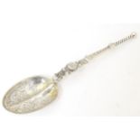 A model of the coronation anointing spoon, hallmarked London 1910, maker Wakeley & Wheeler.