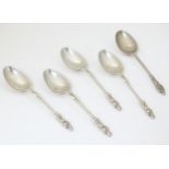 A set of four Victorian silver teaspoons with apostle detail to handles, hallmarked London 1899,