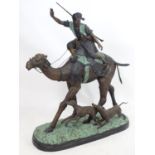 A large French bronze sculpture after Pierre Jules Mene (1810-1879) depicting an Arab riding a camel