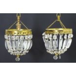 A pair of 20thC pendant bag chandeliers, the cut glass droplets suspended from gilt mounts. 6"