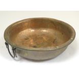 A late 19th / early 20thC twin handled copper bowl / basin with hammered detail. Approx. 6" high x