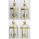 A set of 4 late 20thC pendant lights, the three branch lights hexagonal formed lantern shades with