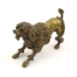 A late 19thC cast model of a poodle dog. Approx. 4 1/2" long Please Note - we do not make