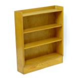 A mid 20thC four shelf utilitarian bookcase. 30" wide x 7" deep x 36" high. Please Note - we do