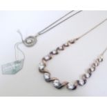 Two silver / white metal necklaces to include one set with Swarovski zirconia. (2) Please Note -