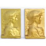 A pair of 20thC plaster cast plaques depicting a man in profile in armour, possibly a stylised