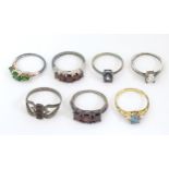 Seven assorted silver rings to include a silver gilt example. (7) Please Note - we do not make