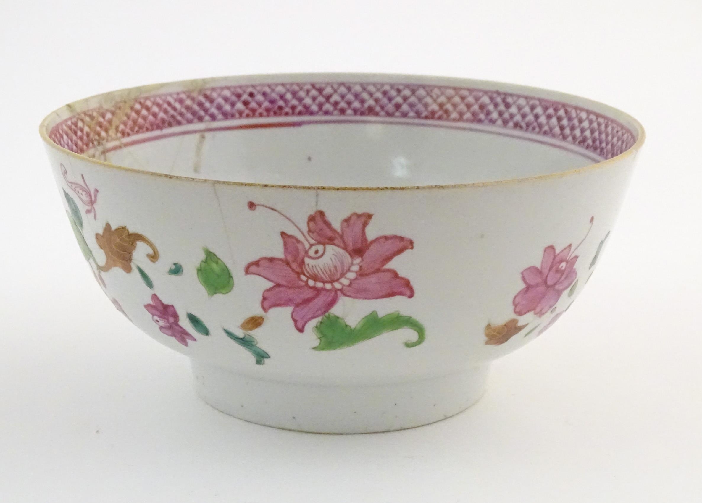 A Chinese bowl decorated with flowers and foliage, with floral motif to centre of interior and - Image 4 of 6