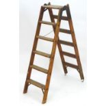 A mid 20thC combination step / straight ladder, marked The Handy 2 in 1 Ladder, constructed from