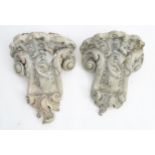 Garden & Architectural, Salvage: a pair of reconstituted stone brackets decorated with scrolling