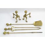 A 19thC fireside companion set, comprising tongs, poker and shovel with pair of fire dogs, each item