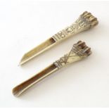 A 19thC carved knuckle bone apple corer love token decorated with engraved initials M. B.,