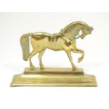A late 19th / early 20thC cast brass door stop / door porter modelled as a horse. Approx. 8 1/2"