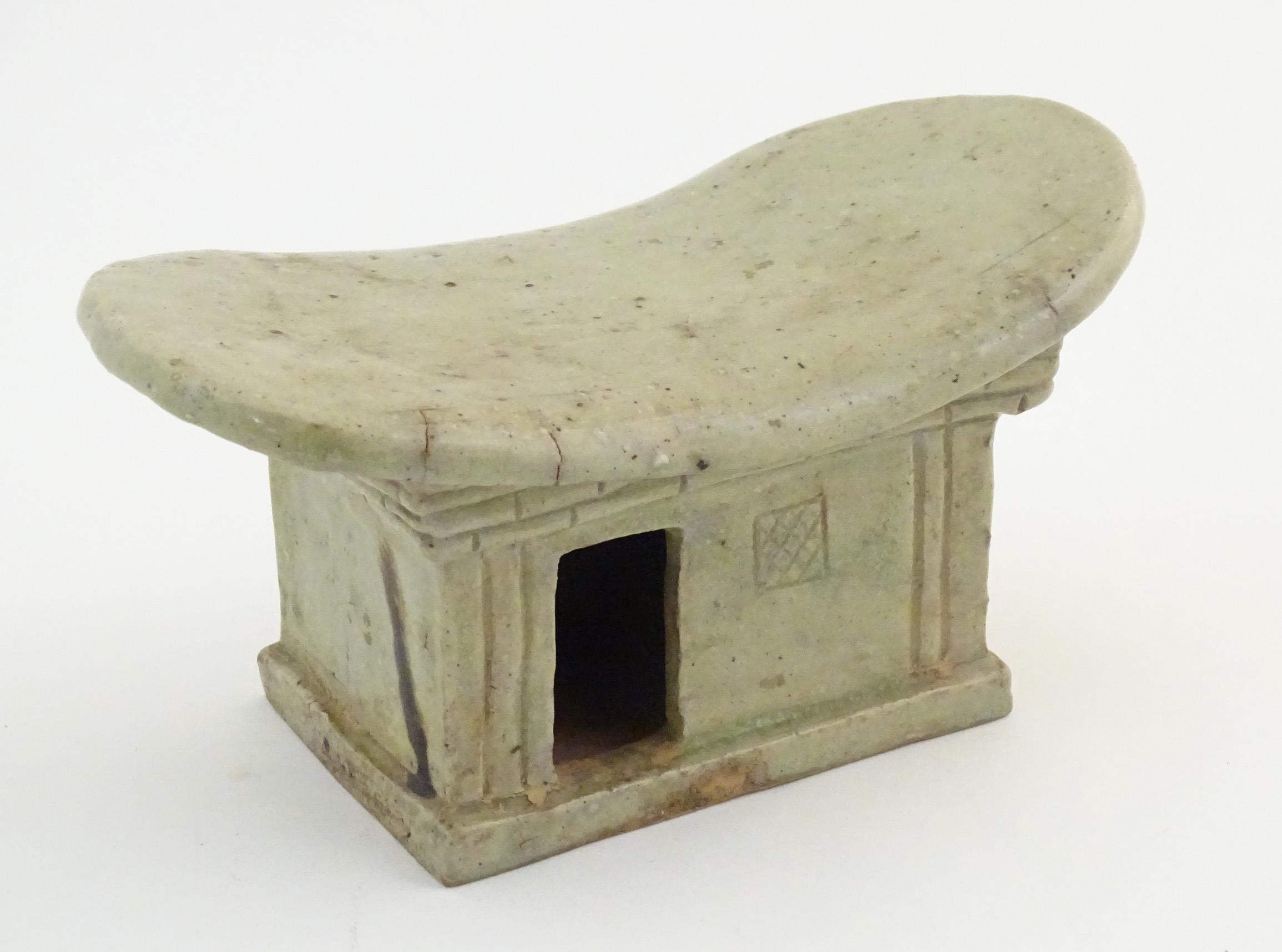 An Oriental stoneware neck pillow / headrest with architectural / building detail. Approx. 4 1/4" - Image 3 of 6