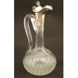 Military interest : A Victorian cut glass claret jug with engraved insignia for Ceylon Rifle