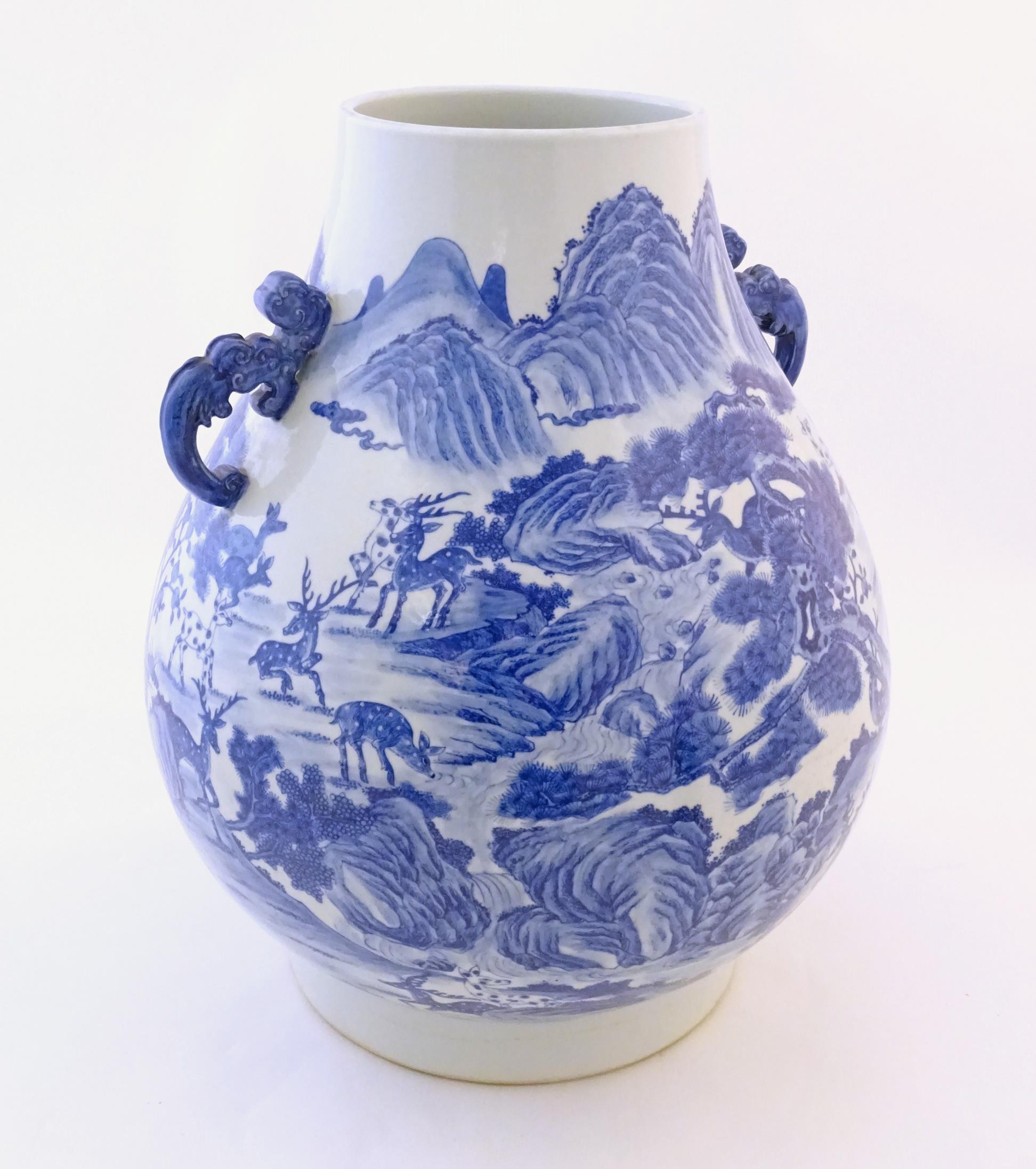 A large Chinese Hu vase with scrolled twin handles, the body decorated in blue and white with the - Image 6 of 9