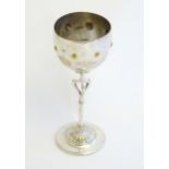 An Arts & Crafts WMF silver plate goblet / trophy cup with embossed decoration. Marked under.