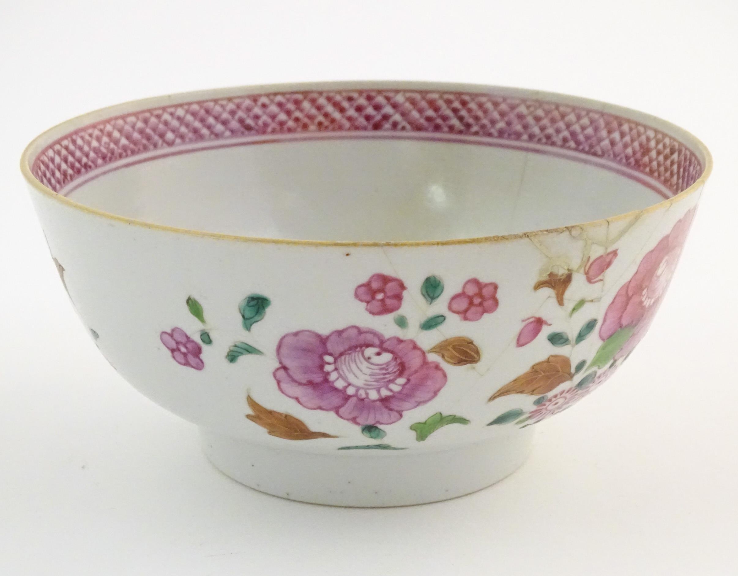 A Chinese bowl decorated with flowers and foliage, with floral motif to centre of interior and - Image 3 of 6