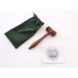 A 20thC Sotheby's presentation gavel with a 250 Years card containing facsimile signatures. Within a