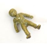 A 20thC brass model of a boy. Approx. 2" high Please Note - we do not make reference to the