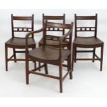 Four Regency period fruitwood dining chairs with curved reeded top rails above ball motifs to the