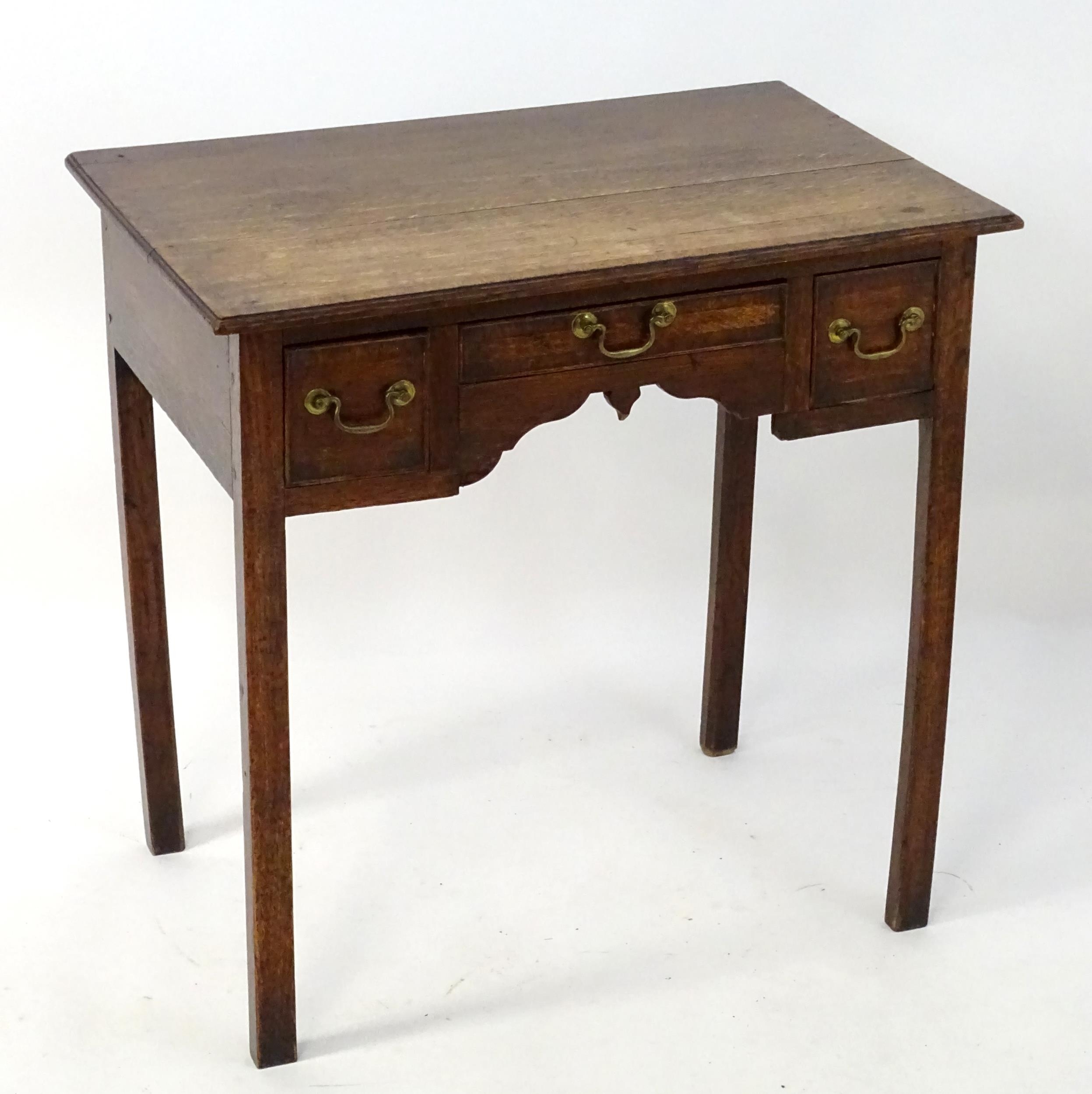 An early 19thC oak lowboy with crossbanded decoration, a rectangular moulded top above three short - Image 3 of 4