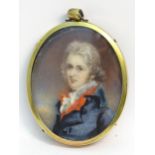 A 19thC English School watercolour portrait miniature depicting a gentleman in a blue jacket.