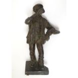 An early 20thC bronze model of a man wearing a flat cap drinking. Bears label under. Approx. 14 1/2"