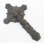 A 19thC cast lead crucifix with Corpus Christi and INRI flag above, with traces of polychrome