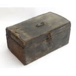 An 18thC coaching trunk / case, of oak construction with pinned leather exterior and hand forged