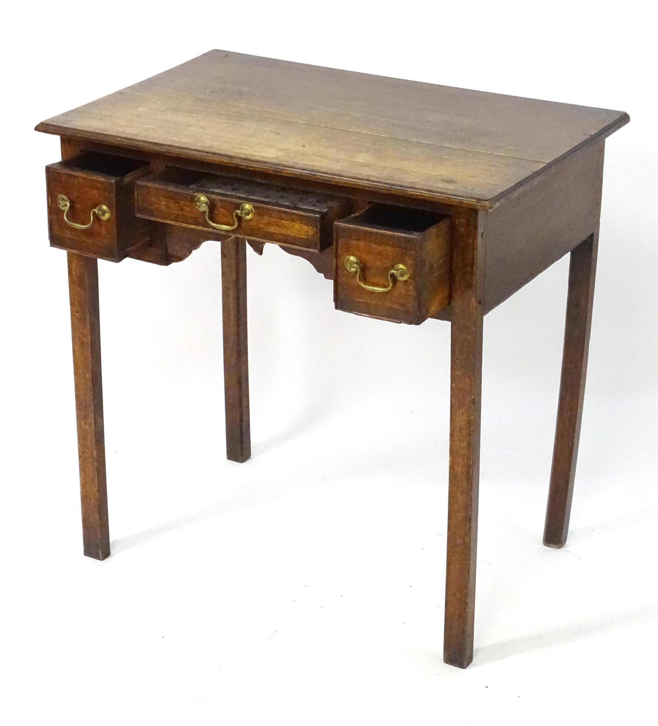 An early 19thC oak lowboy with crossbanded decoration, a rectangular moulded top above three short - Image 4 of 4