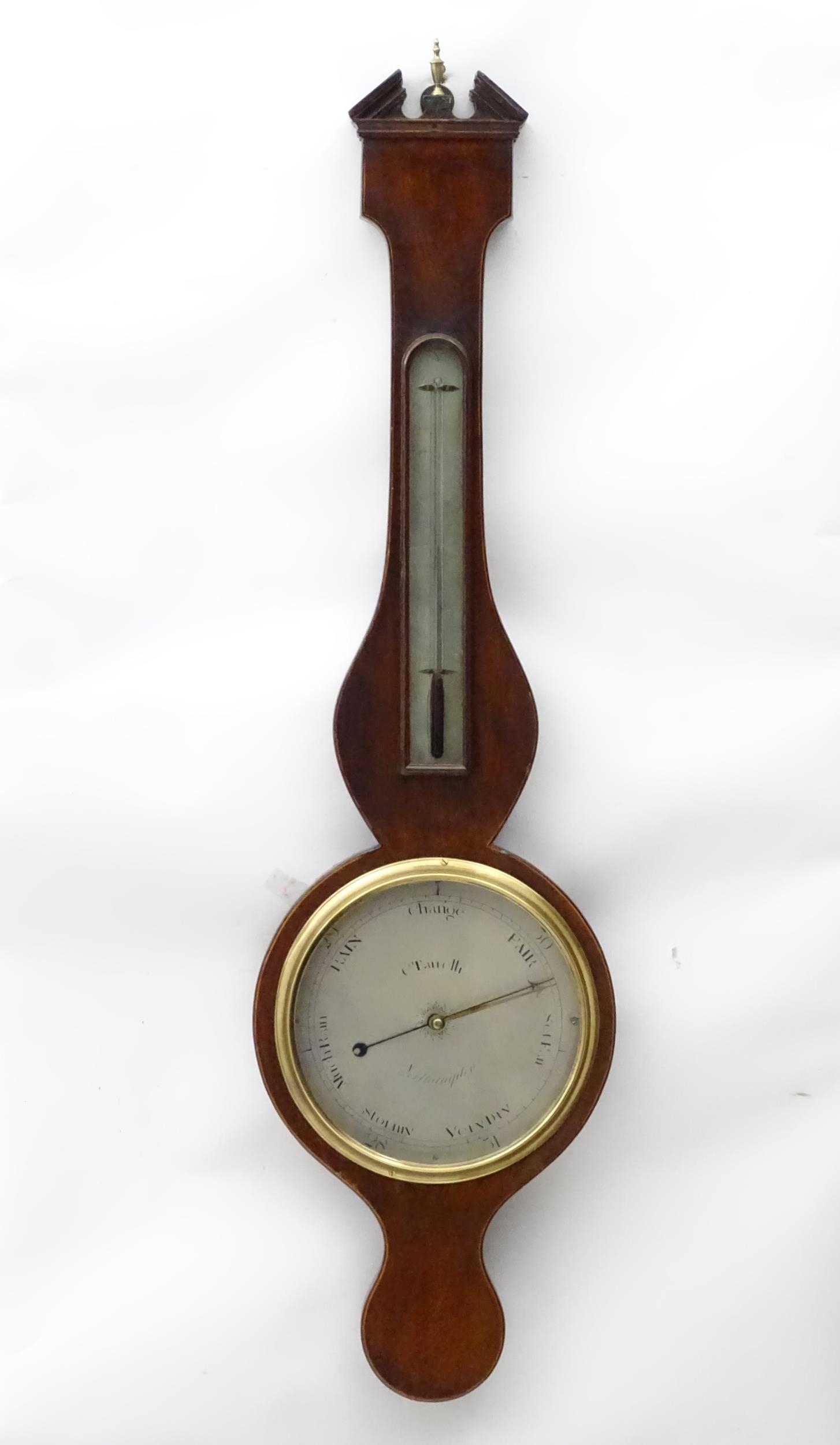 Local Interest- Northamptonshire : A mahogany wheel barometer, signed C. Tarrelli, Northampton.