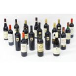 An assortment of red wines, including a Chateau de la Garde Bordeaux Superior 2000 75cl, a
