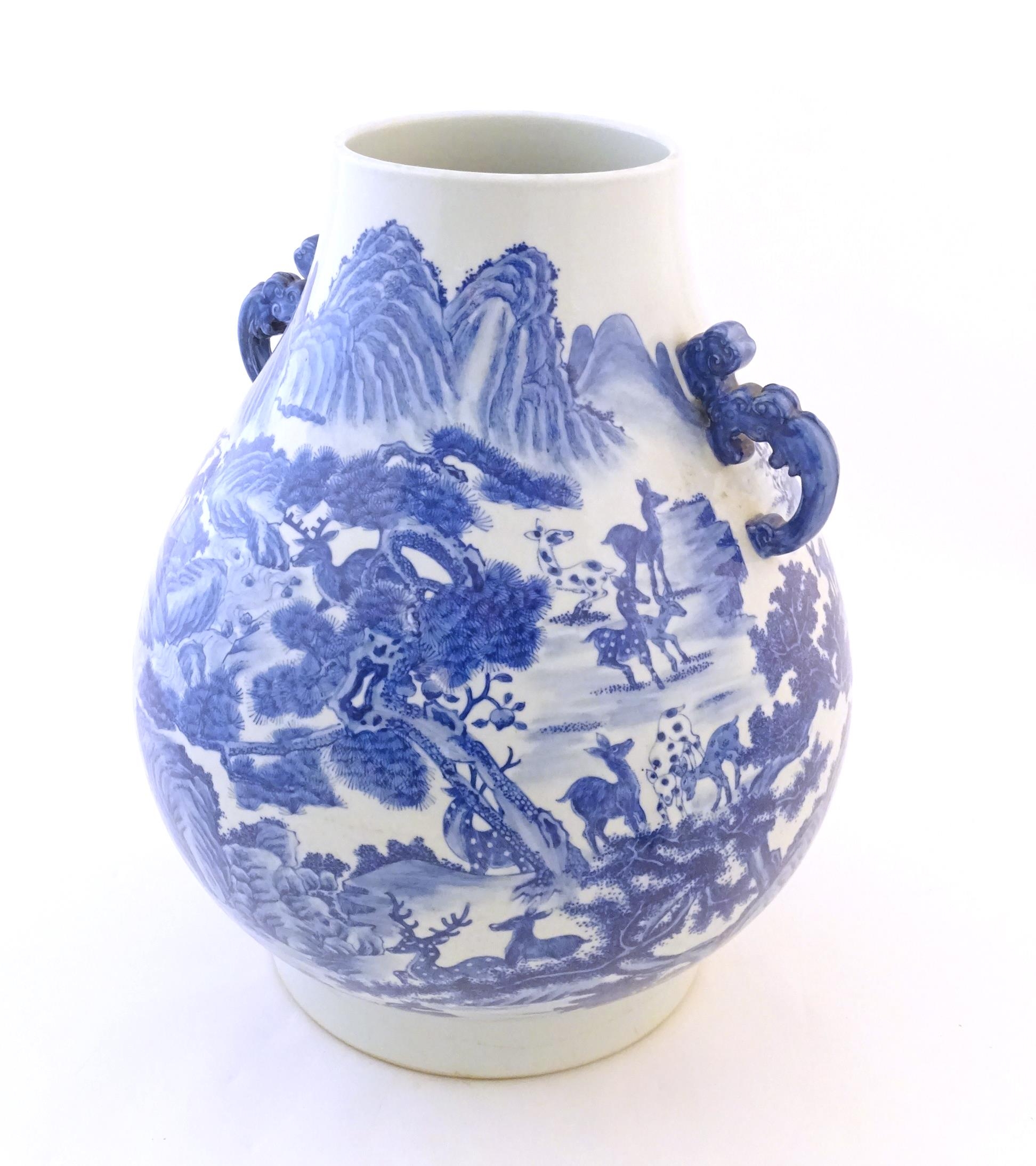 A large Chinese Hu vase with scrolled twin handles, the body decorated in blue and white with the - Image 7 of 9