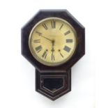 A drop dial wall clock, the 12" dial within a hexagonal shaped case. 26" high overall. Please Note -