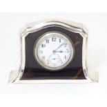 A silver and tortoiseshell mantle clock, hallmarked Chester 1915, maker Henry Matthews. Approx. 3