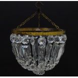 A pendant bag light shade with glass lustres. Approx 8" diameter Please Note - we do not make