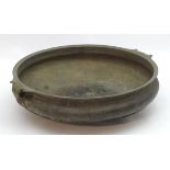A 19thC large bronze basin / planter of circular form with twin handles and relief stylised heart