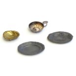 Four assorted items to include a silver plate wine tasting cup with embossed detail, a small cast