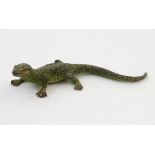 A cold painted bronze model of a lizard. Approx. 3" long Please Note - we do not make reference to