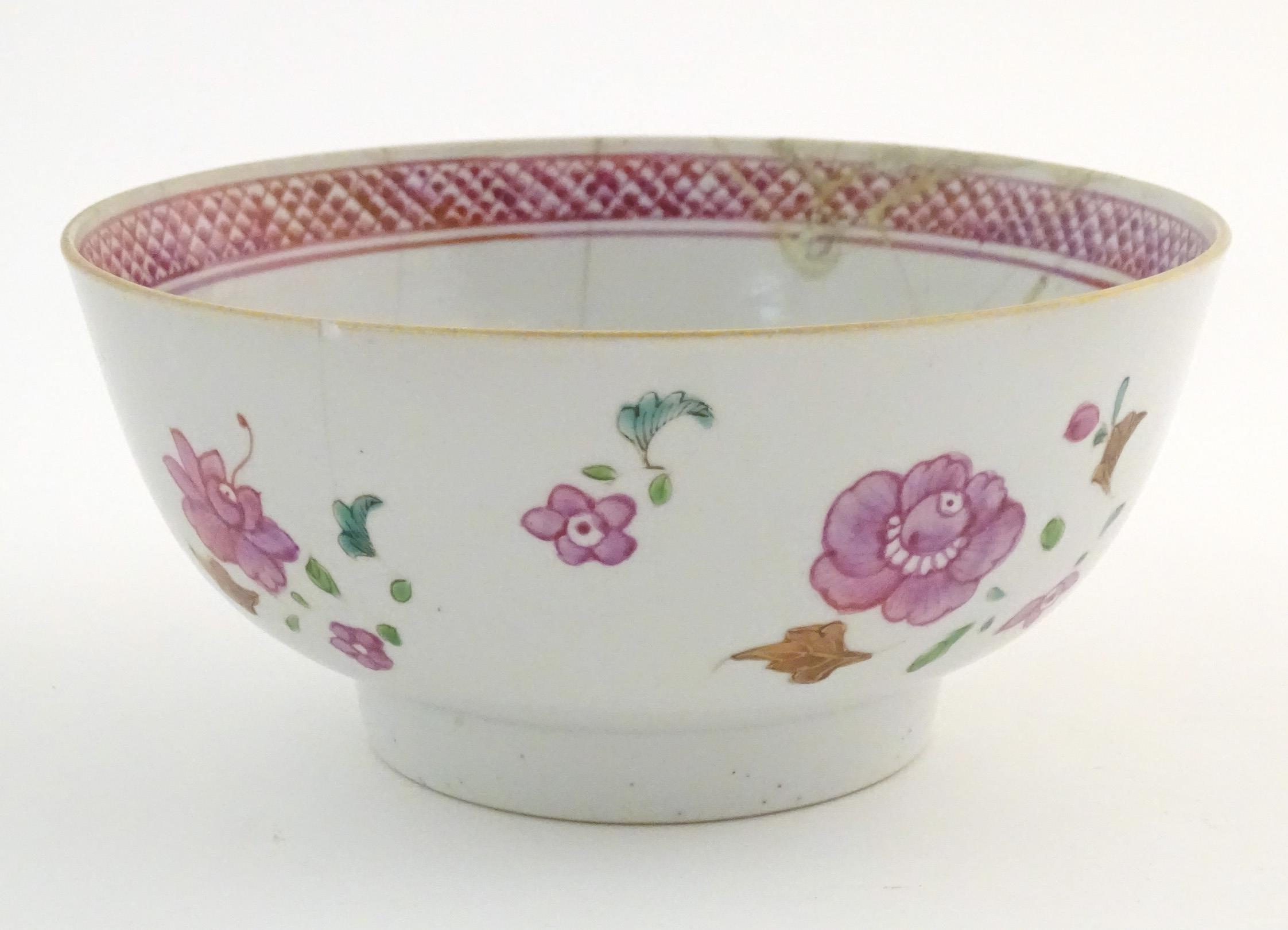 A Chinese bowl decorated with flowers and foliage, with floral motif to centre of interior and - Image 5 of 6